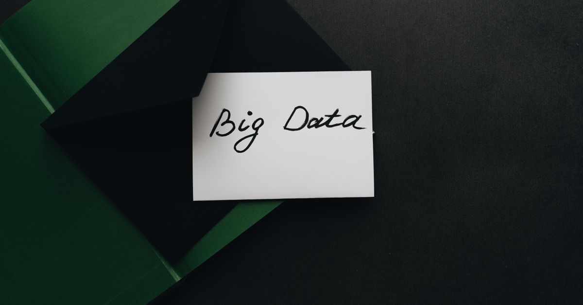 A minimalist photo of a card with 'Big Data' text inside a green envelope, showcasing modern concepts.