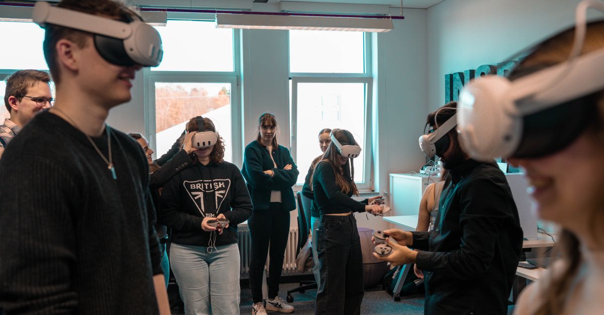 A group of diverse adults using VR headsets in an office setting.