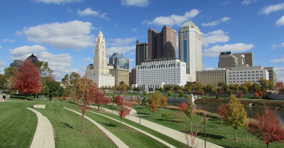 Experience the striking skyline of downtown Columbus, Ohio in the vibrant colors of fall.