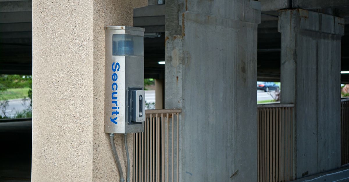 A security device mounted in a parking garage enhances safety and connectivity.