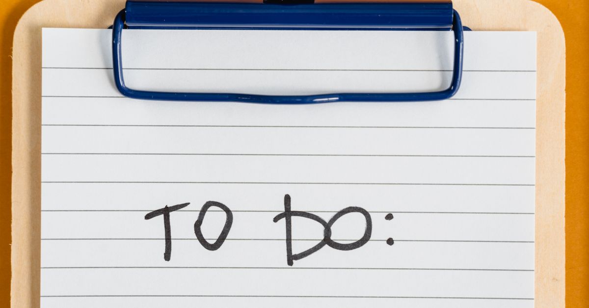 Clean and simple image of a to-do list on a clipboard with lined paper.