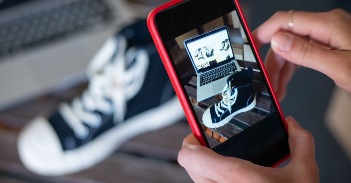 Capturing sneakers with a mobile phone for an online store showcase. E-commerce at its best.