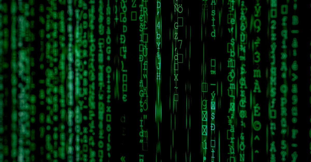Abstract green matrix code background with binary style.
