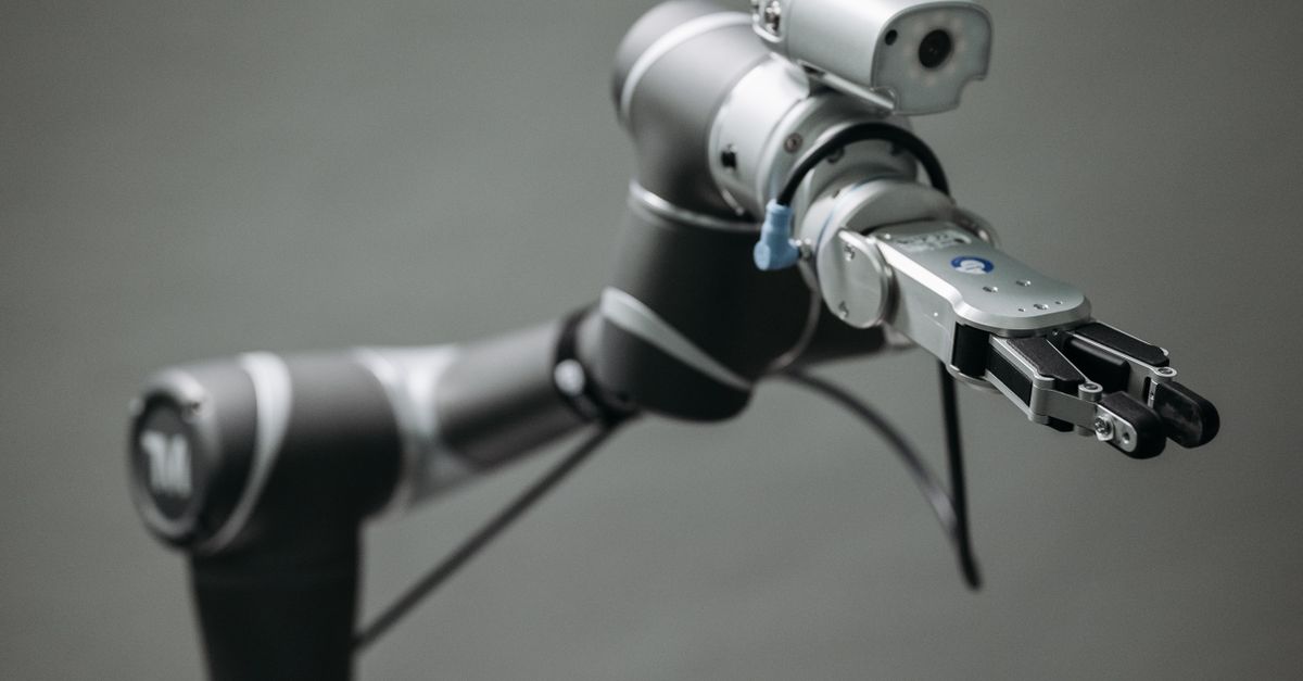 Close-up view of a robotic arm equipped with a video camera, showcasing modern technology.