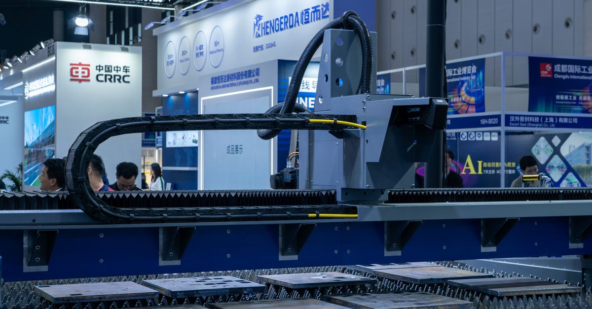A view of advanced industrial machinery displayed at a trade fair exhibit.