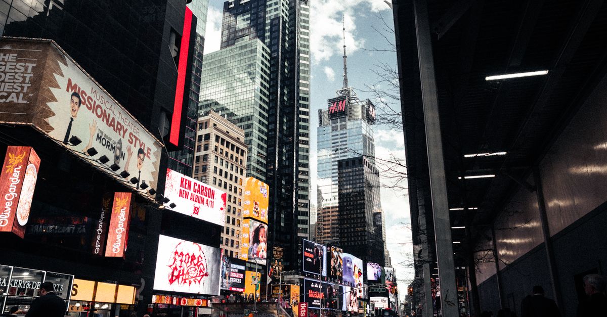 Vibrant view of Times Square's bustling city life, showcasing skyscrapers and billboards in New York City.