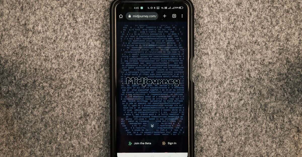 A smartphone showing the Midjourney website on its screen against a gray textured surface.