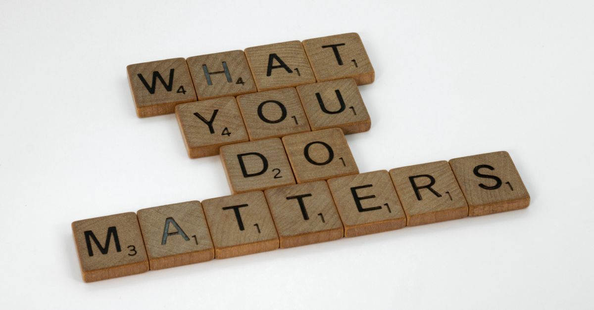 Wooden letter tiles spelling 'What You Do Matters' on a neutral background.