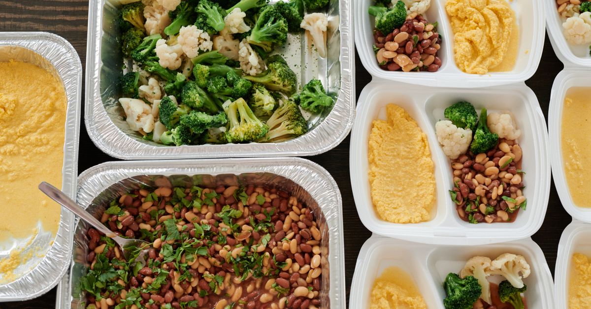 Healthy meal prep with broccoli, beans, and polenta in containers.