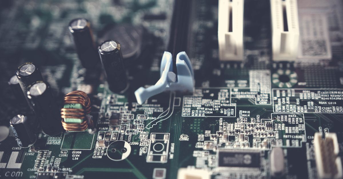 Detailed view of components on a computer motherboard, showcasing technology and circuitry.