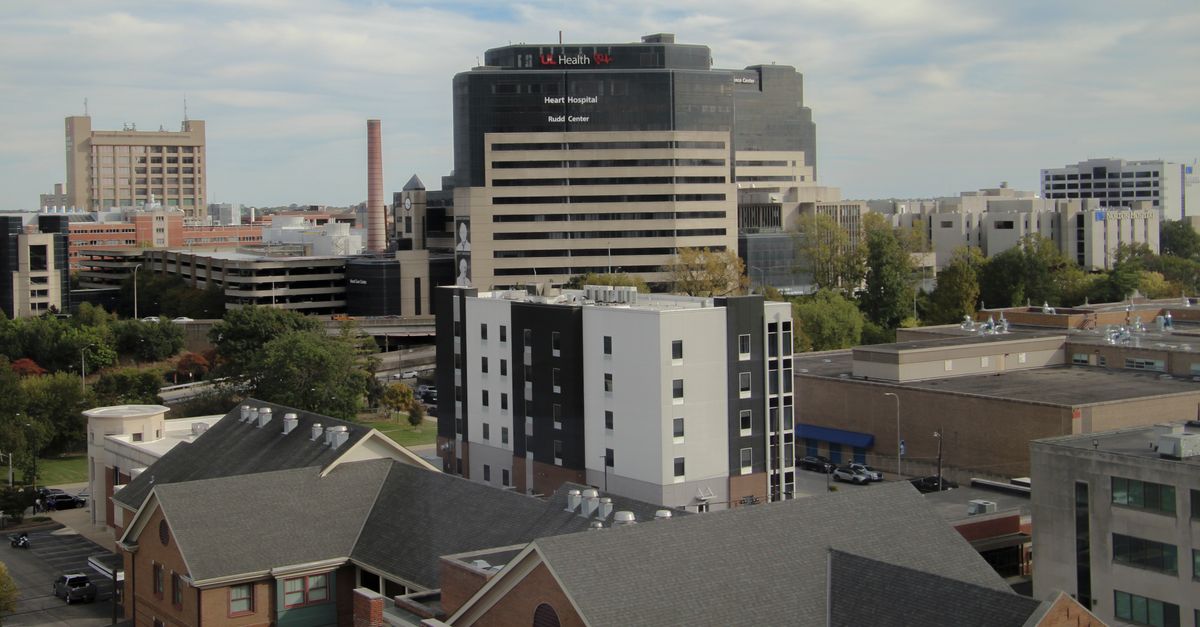 Aerial view of an urban medical center featuring a prominent hospital building.