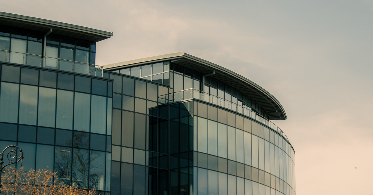 A contemporary glass office building in Chester, England showcasing modern architecture.