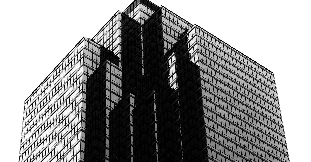 Stunning black and white shot of a Dallas skyscraper highlighting urban architecture.