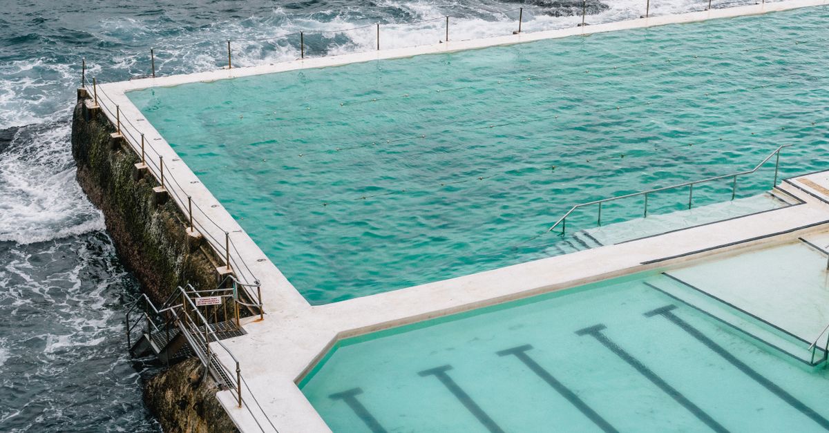 A breathtaking aerial shot capturing Bondi Icebergs swimming pool against the ocean waves.