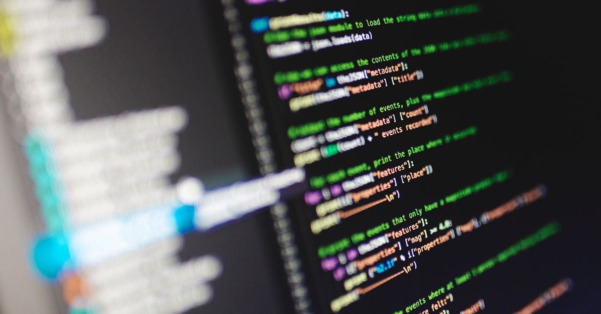 Close-up of a computer screen displaying colorful programming code in JavaScript.