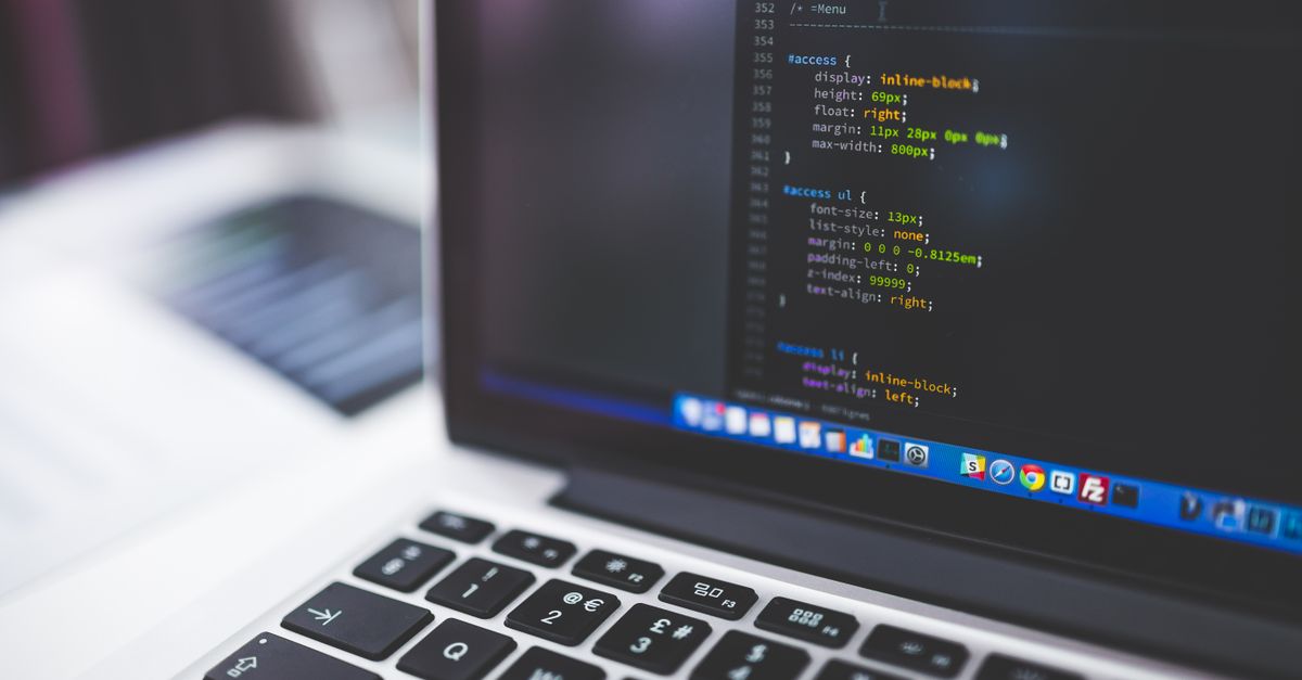 Laptop screen displaying code, perfect for tech-focused projects.
