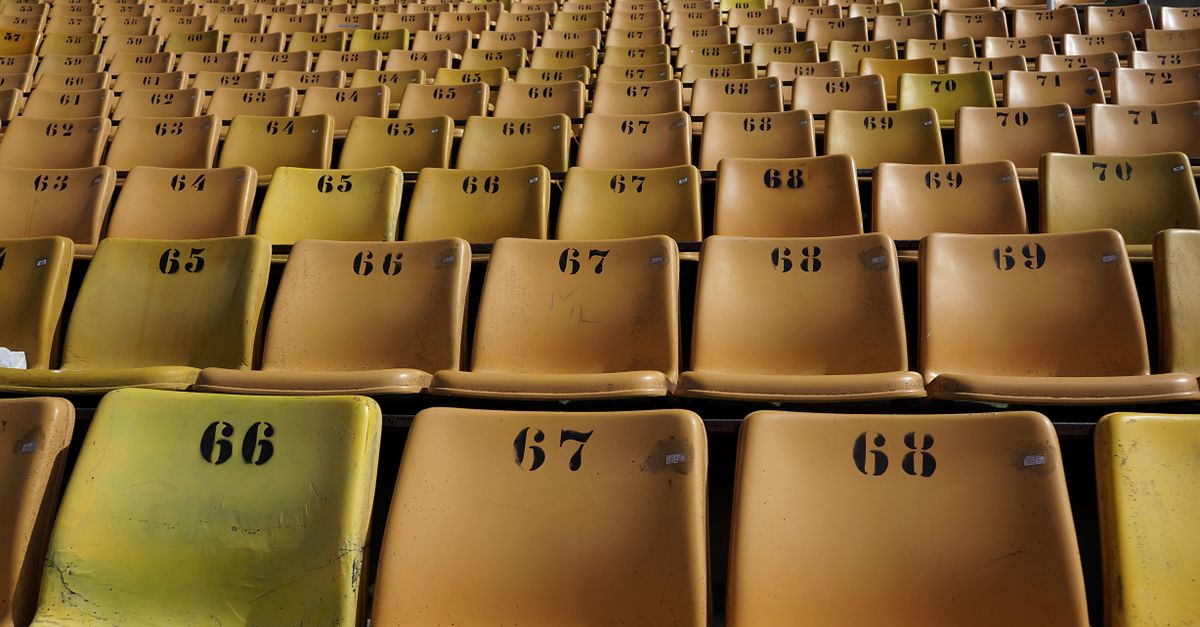 Rows of empty numbered seats at a stadium in Sao Paulo, ideal for sports or event photography.