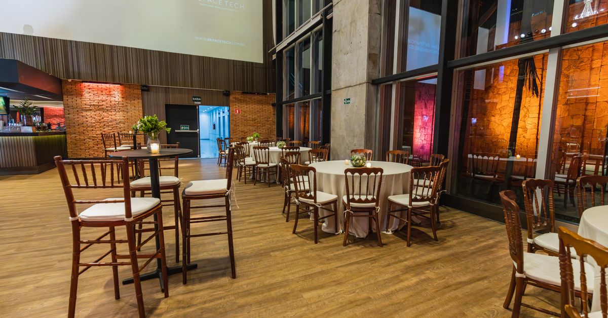 Spacious modern event hall with elegant decor ready for a celebration.